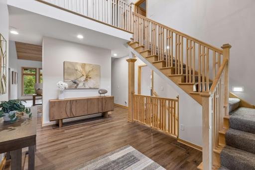 Beautifully designed foyer filled with natural light and an open staircase make this home truly special.