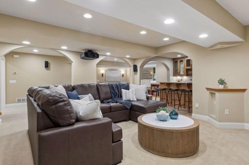 Dedicated home theater area just off the bar, perfect for entertaining.