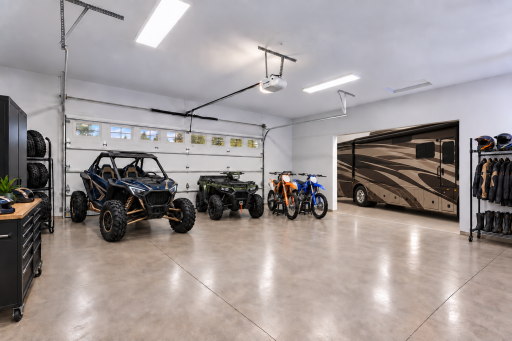 1200 square foot Man Cave DELUXE! The outbuilding is a true gem and super sized to fit all the toys! Virtually staged with A.I