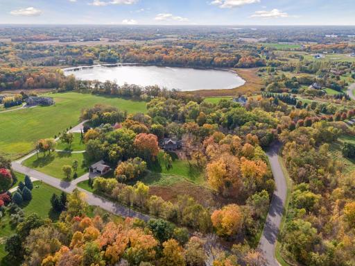 Private acreage lot nestled on 5 acres with incredible fall colors!