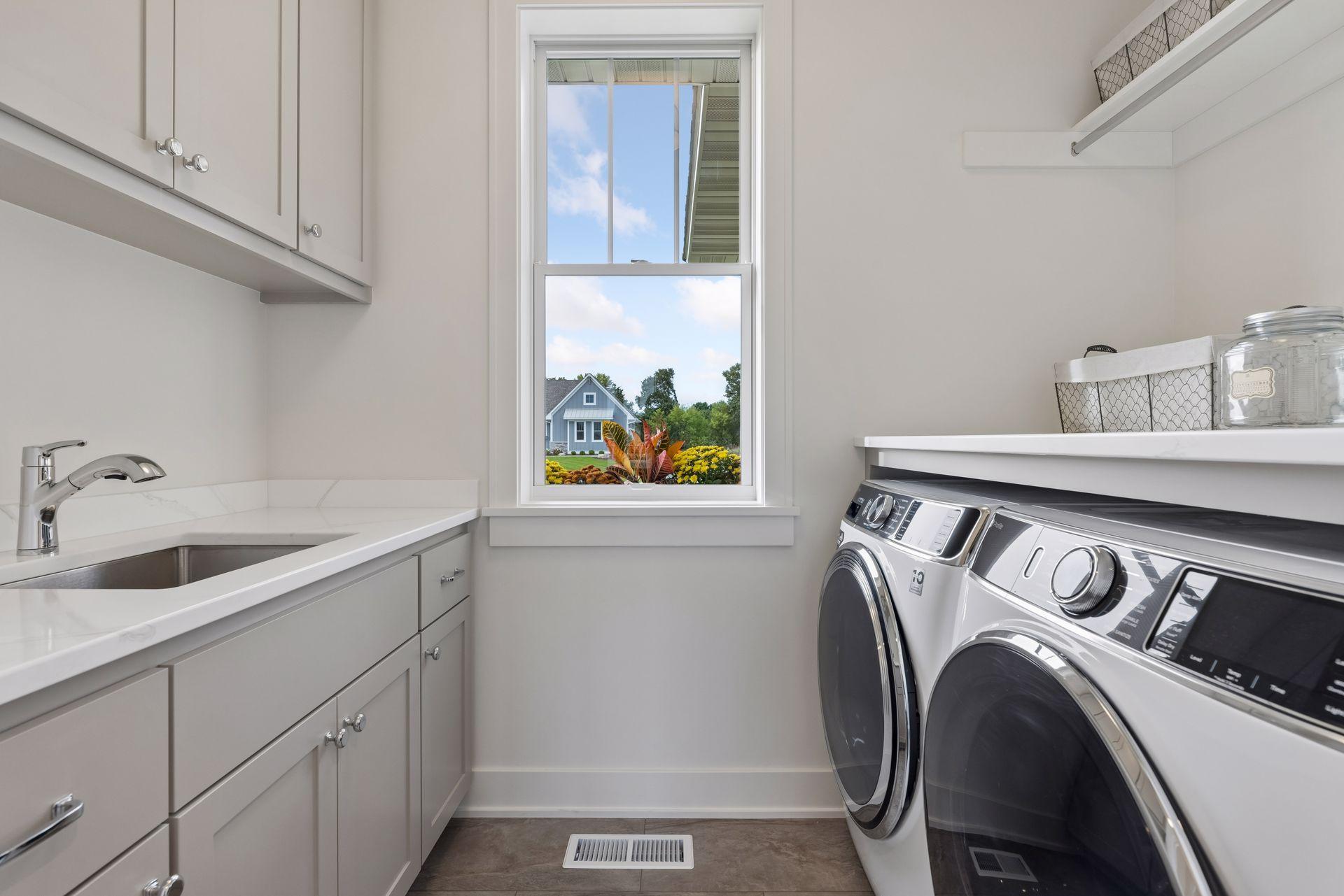Laundry with storage space and sink