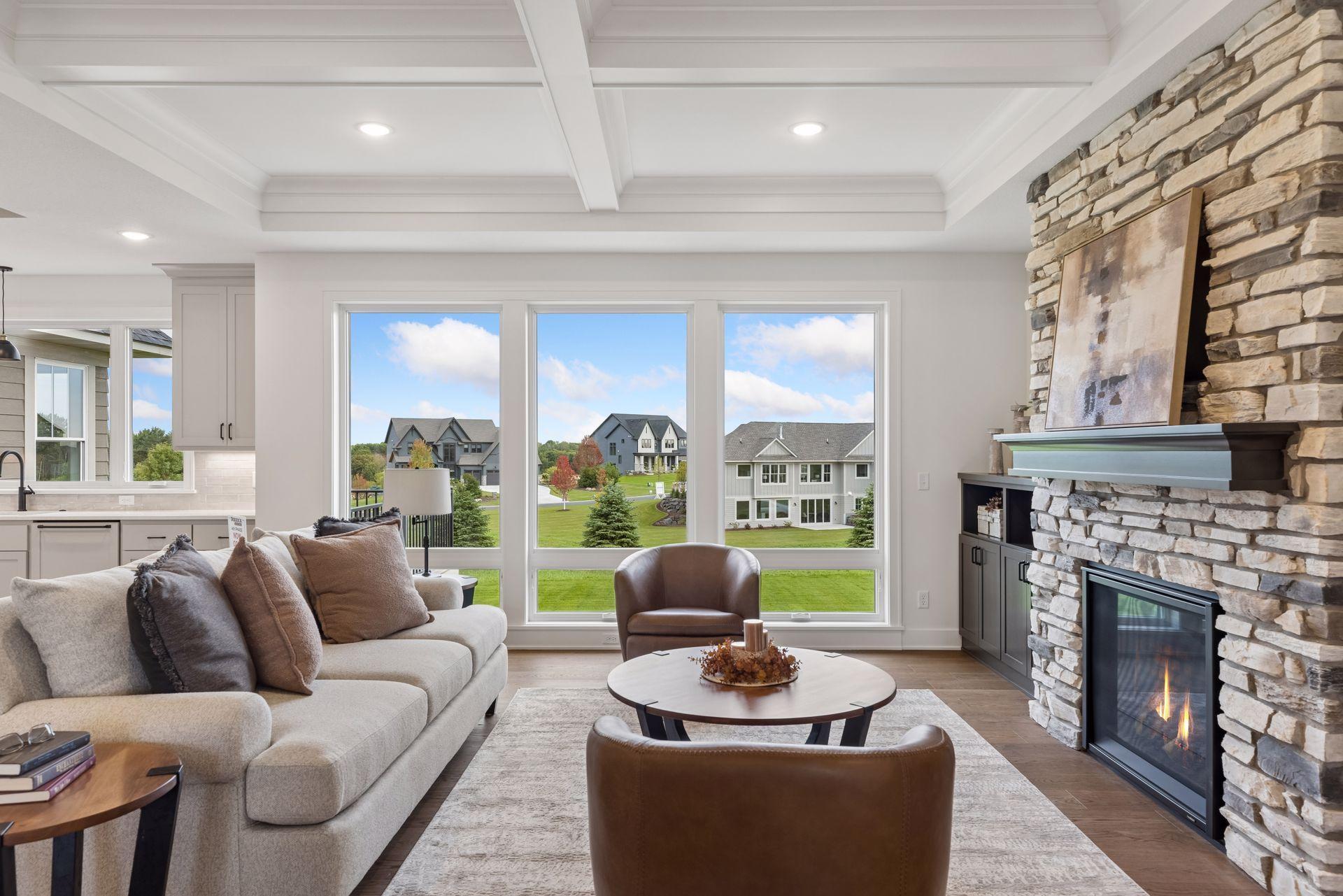 Large picture windows engulf the home in natural light