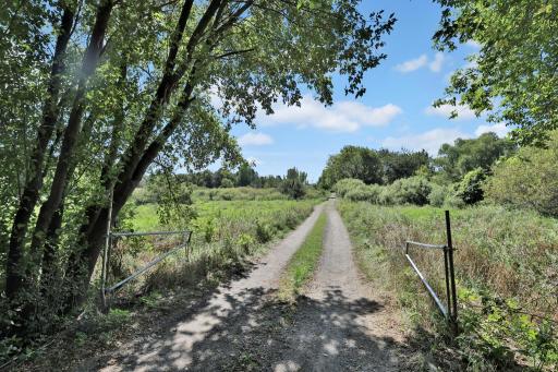 Photo for 15573 209th Avenue NW, Elk River, MN 55330 - listing #7144521 Gate at property entrance (use lockbox to remove chain)