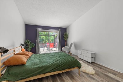 Spacious primary with direct access to the deck