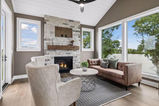 Walls of windows, stunning fireplace and views to die for