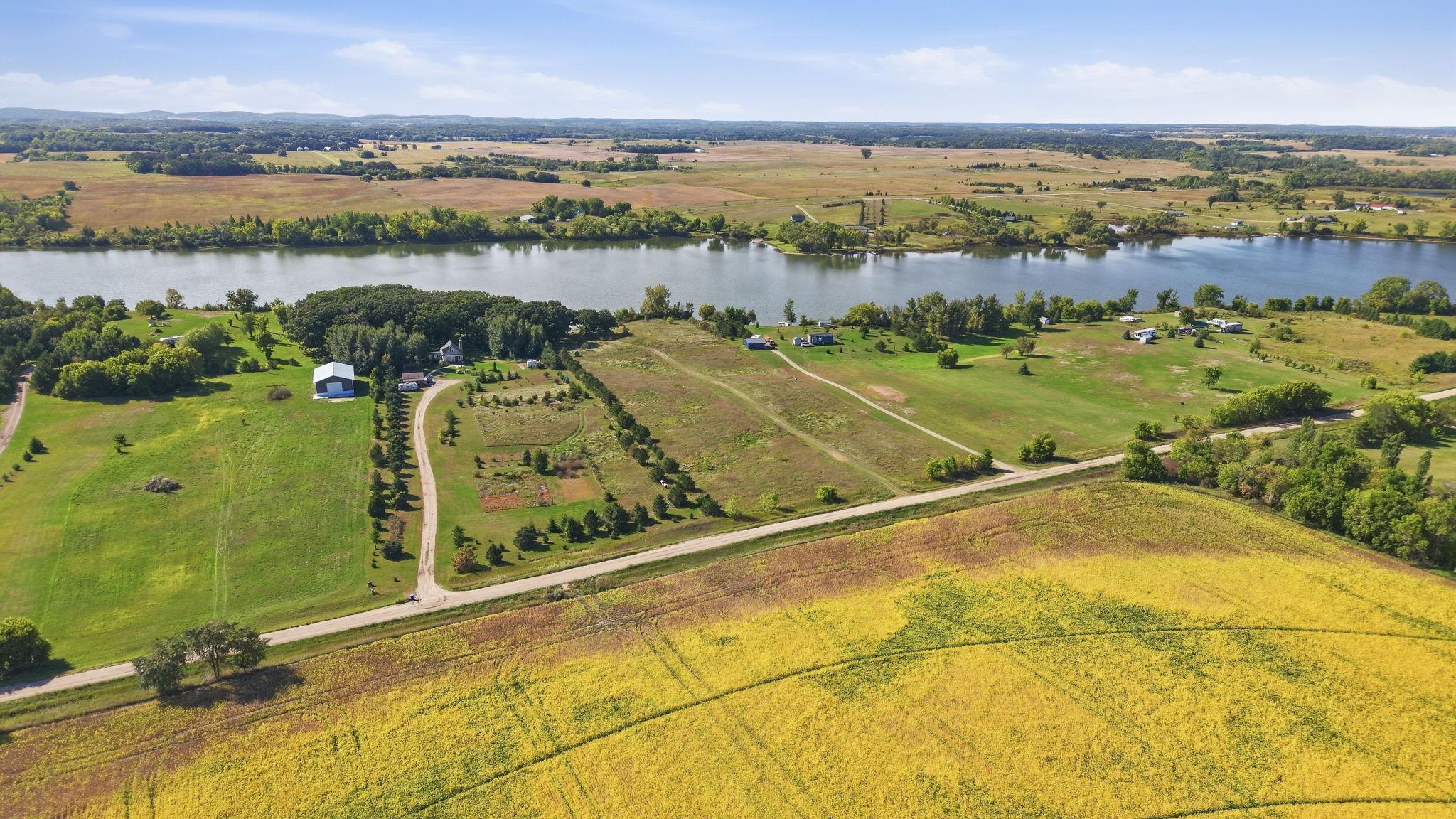 The drone view gives a broader look at the property and its surrounding area.