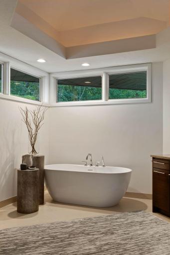 New soaking tub with handheld sprayer.