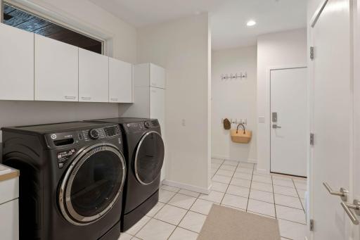 Laundry and Mudroom with side entry and garage access
