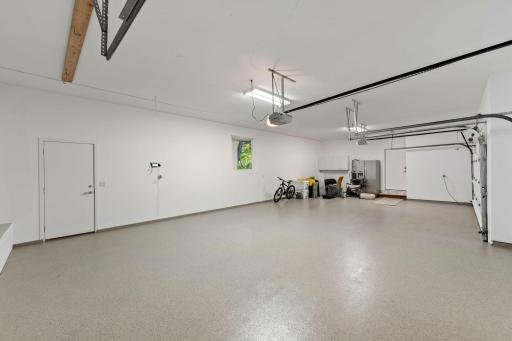 4 car garage w/service door to the east yard.