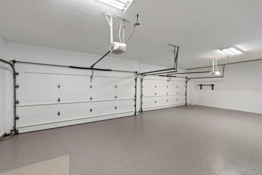4-Car garage, new floor finish and painted walls and ceilings.