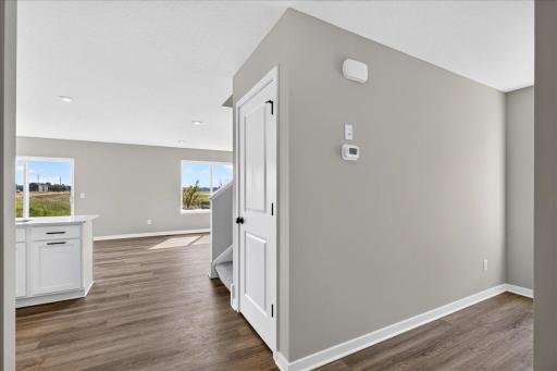 PHOTO OF A DIFFERENT HOME WITH SIMILAR PLAN AND FINISHES.