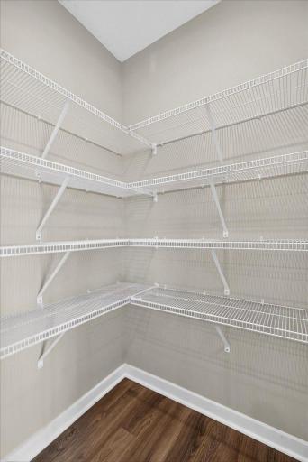 PHOTO OF A DIFFERENT HOME WITH SIMILAR PLAN AND FINISHES. Kitchen Pantry.