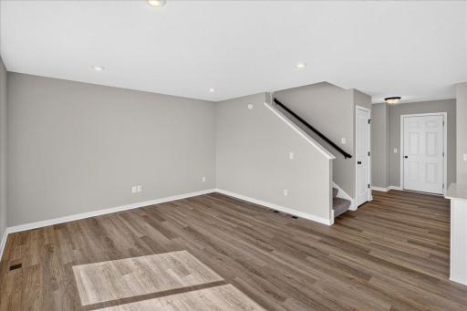 PHOTO OF A DIFFERENT HOME WITH SIMILAR PLAN AND FINISHES.