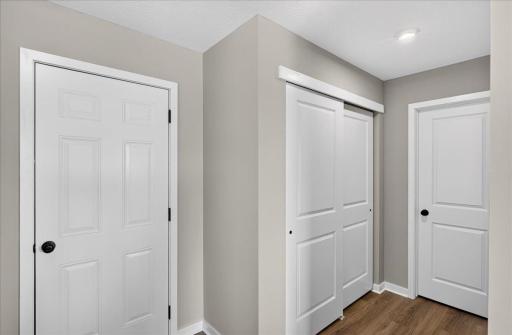 PHOTO OF A DIFFERENT HOME WITH SIMILAR PLAN AND FINISHES.