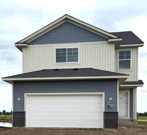 3050 Jandura Ave NE- Home is currently under construction offering a late October move-in. Highlights include a Walkout Lower Level ready for future finish! Stone accents, sidewalk, and driveway will be installed soon.