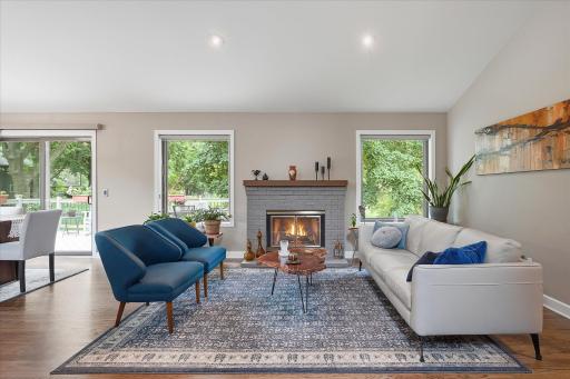 Living room with wood burning fireplace