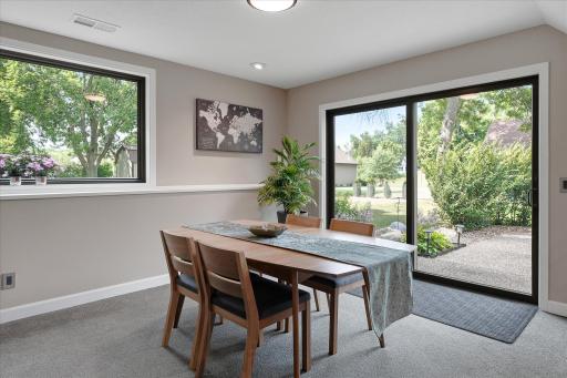 Tons of fun to be had at this table with direct access to patio of the side of this home