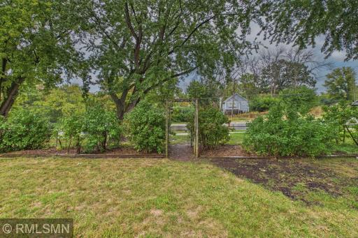 Backyard landscaped with walk through