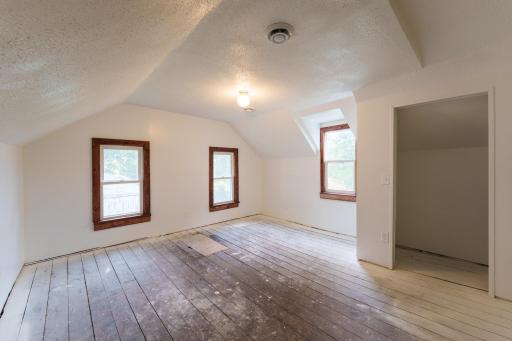 Bedroom 1. The upper level was gutted and renovated with new insulation, wiring, and sheetrock. There are 3 great-sized bedrooms on the upper level.