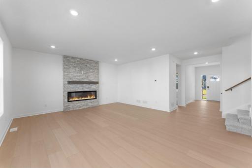 The Great Room features large windows for ample natural light and is the perfect place for gathering with friends and family.