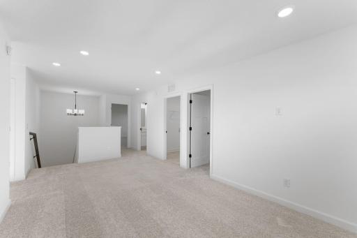 The loft area is located at the top of the stairs on the second floor and is well-suited for a living room or children’s area.