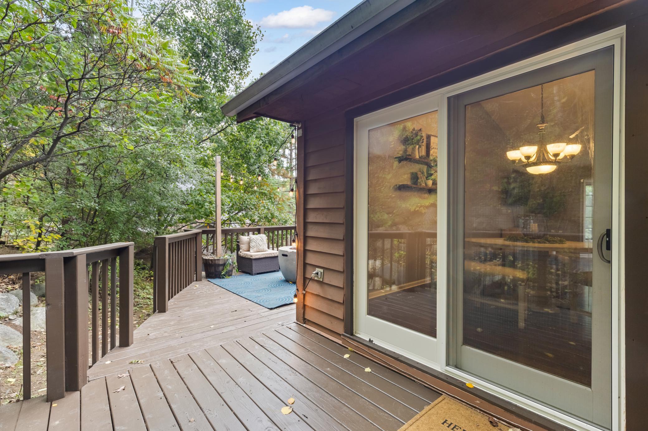 Access to the deck from the Dining area and Kitchen