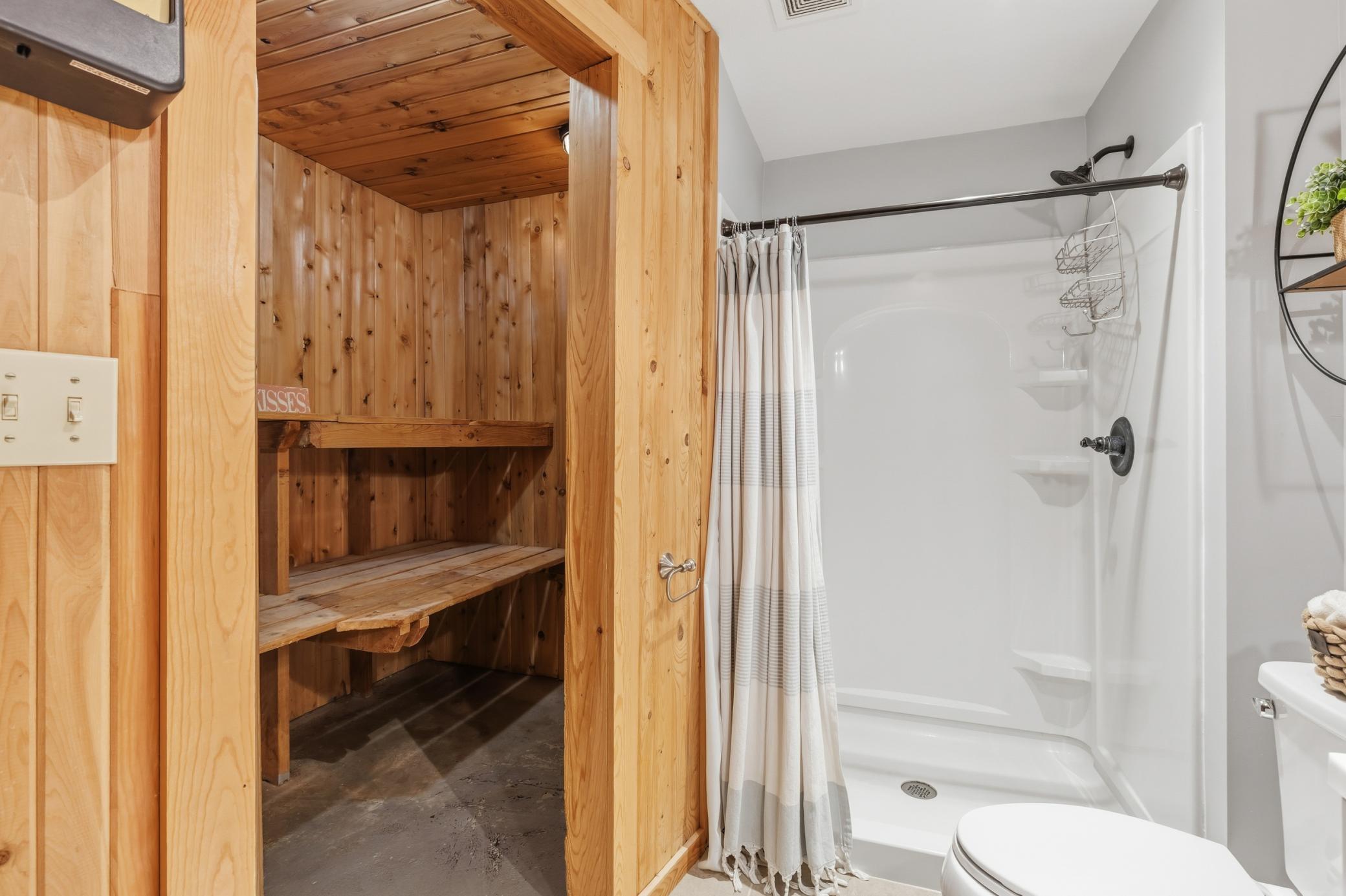 The 3/4 bathroom also features a sauna wrapped in cedar!
