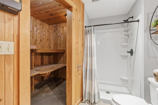 The 3/4 bathroom also features a sauna wrapped in cedar!