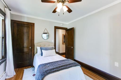 Main floor bedroom 2 with large closet â virtually staged