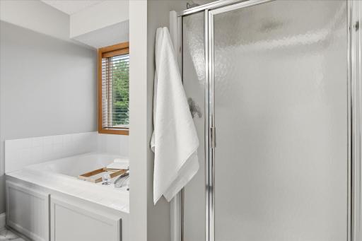 Primary bath with separate jetted soaking tub & shower