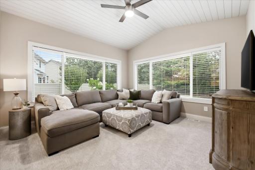 Sun-filled four-season room overlooking the backyard