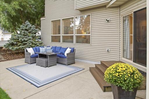 Patio just steps from the kitchen makes indoor/outdoor entertaining easy