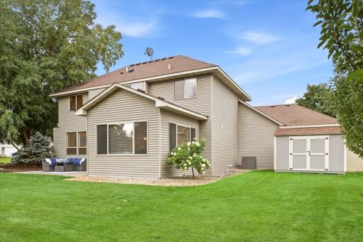 Large storage shed provides valuable extra storage in addition to the three-car garage