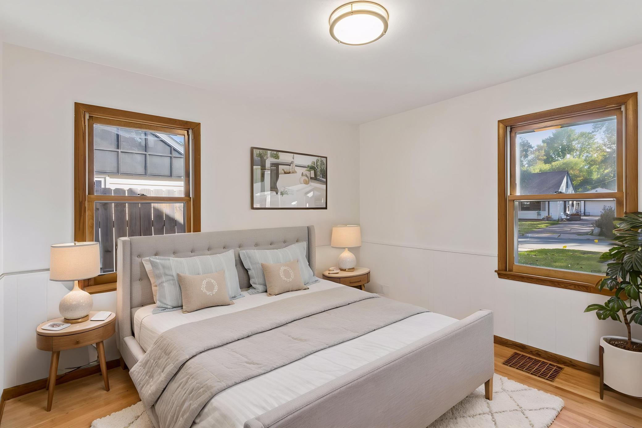 Main floor bedroom 1 with large closet - virtually staged