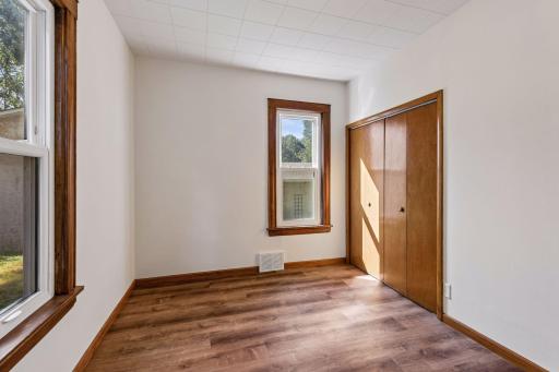 Main floor bedroom with walk-in closet