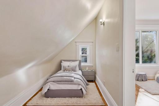 Upper bedroom 2 closet, could be a kids room - virtually staged
