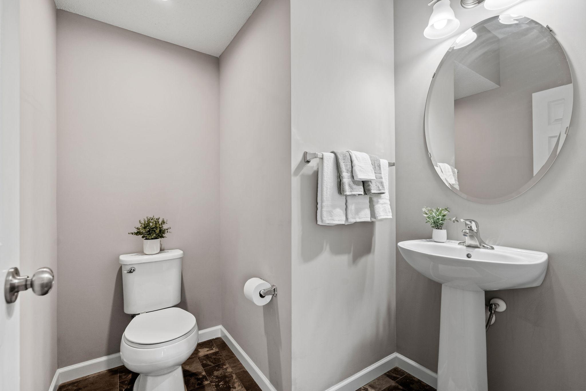 The powder room is on the main for ease and guest use