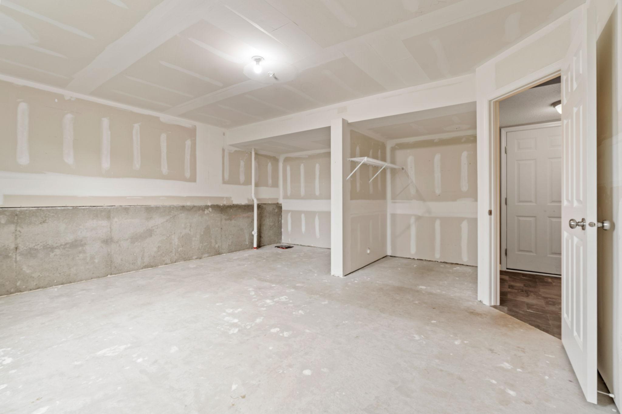 To the left is a rough in for a 4th bathroom and the right is a closet for this area.