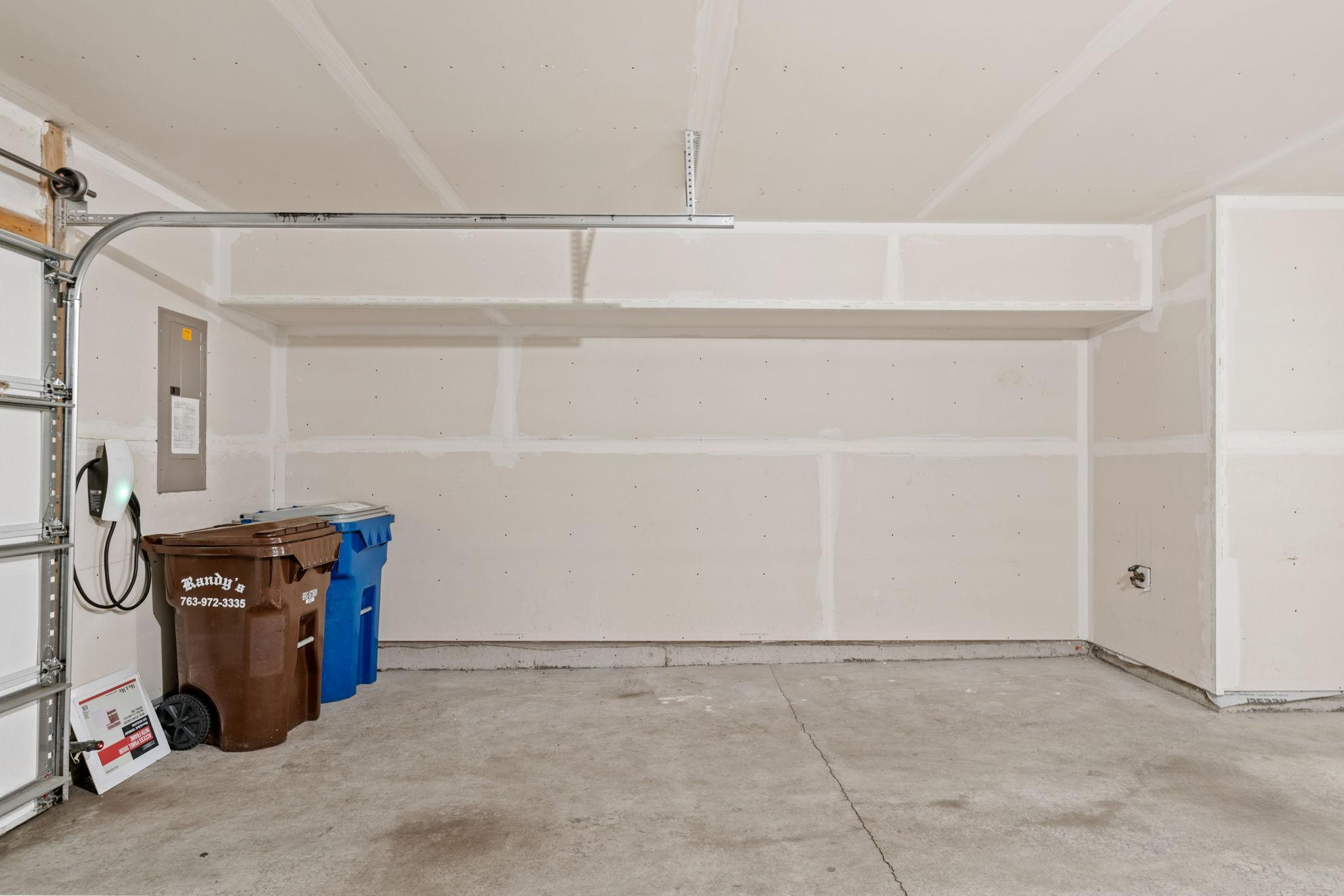 This bump-out is perfect for shelving, motorcycle, jet ski or other toys. Notice the water spigot to wash your car in the driveway or to help with garage floor clean up