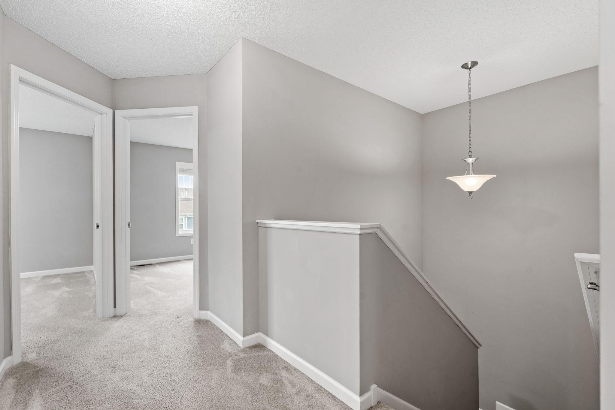 Once upstairs you will find 3 bedrooms, 2 bathrooms & the laundry room