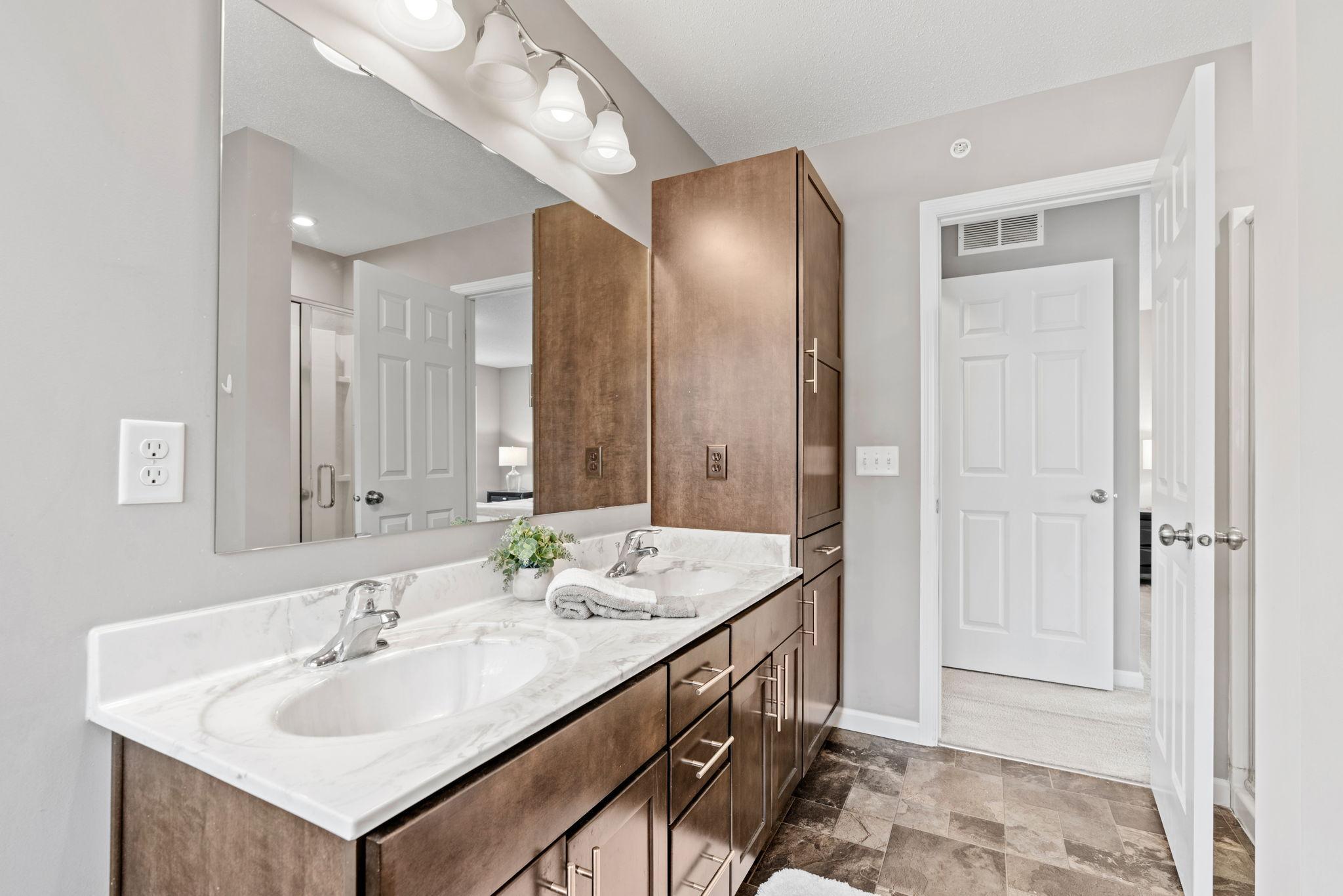 Note the linen cabinet for extra storage