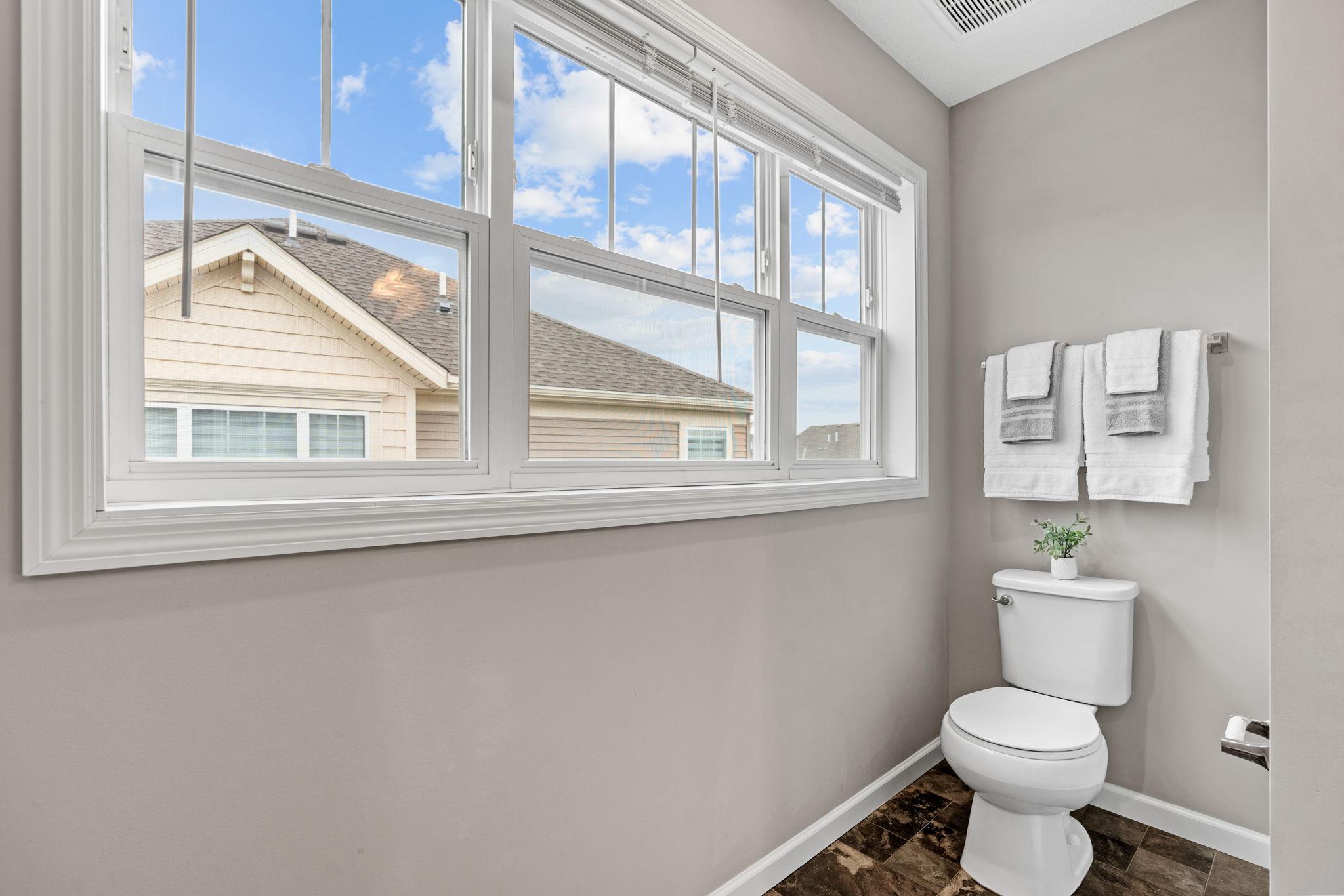The large windows lets the light stream in