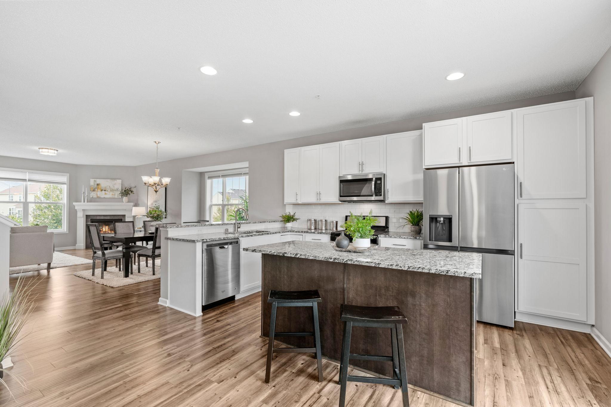 The home comes with stainless steel appliances A pantry ( left of the refrigerator) with pull out drawers and extra lighting in the ceiling