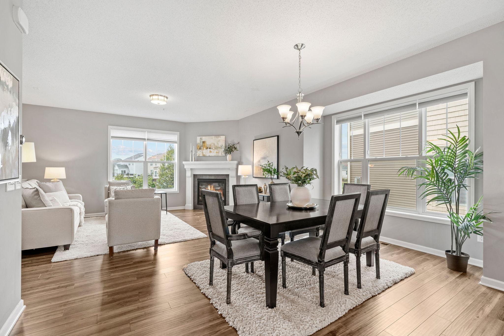 Reverse view of the Dining room and Living room. Notice the grandeur of the 9ft ceilings all the light coming in the windows