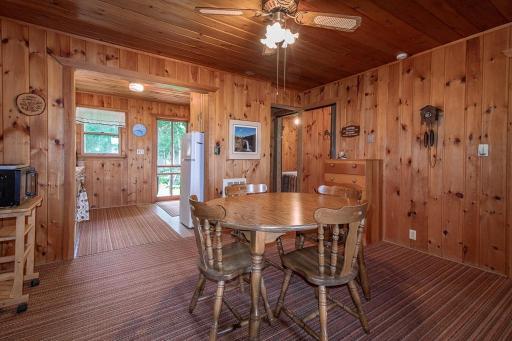 Spacious Dining area has room to spread out! Cabin to be sold furnished!