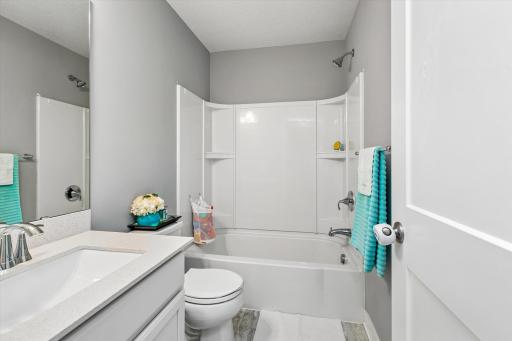 Second full-bath services other two bedrooms
