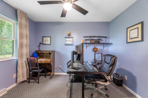 Bedroom with ample room for a workspace or guest setup