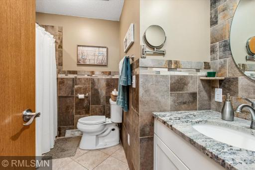 Remodeled full bath with awesome tile work and tile surround in the tub/shower.