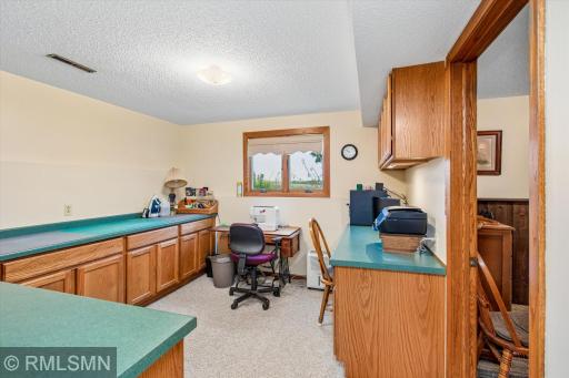 Office/craft area in the lower level - great counter and cabinet space!