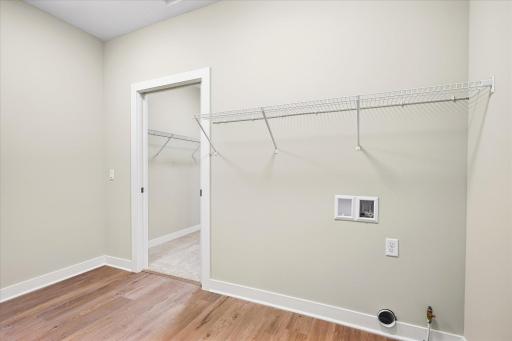 Laundry room conveniently located on the backside of the main bedroom walk in closet.
